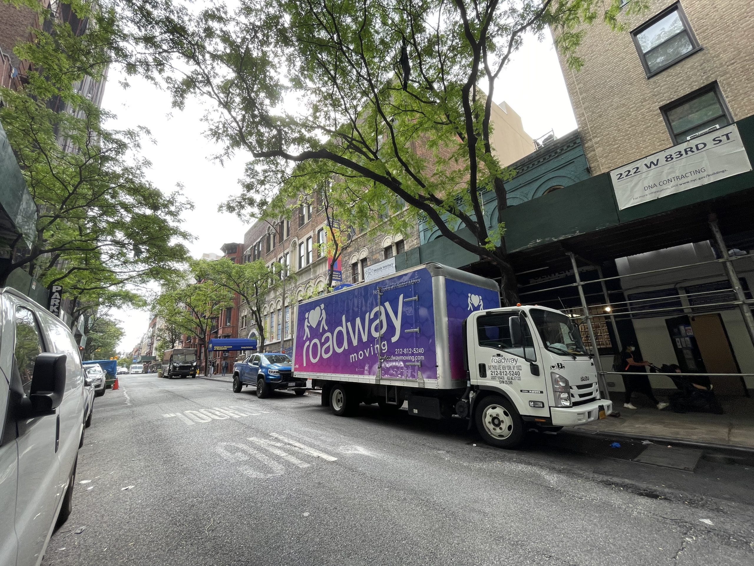 roadway purple truck on the street