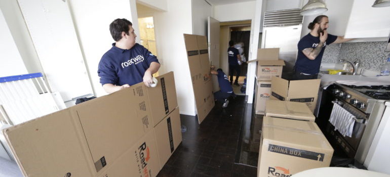 Movers in the apartment