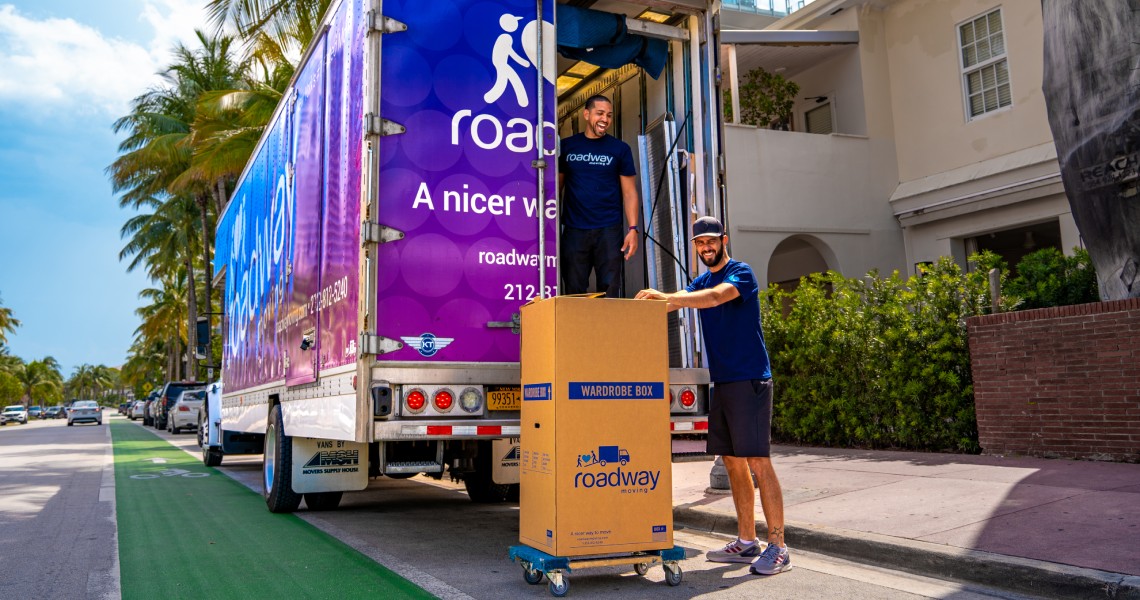 Roadway Moving's truck and crew during a move in West Palm Beach