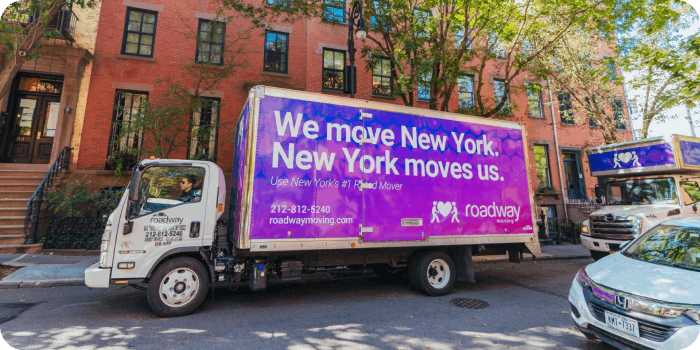 Roadway Moving truck parked on a New York City street