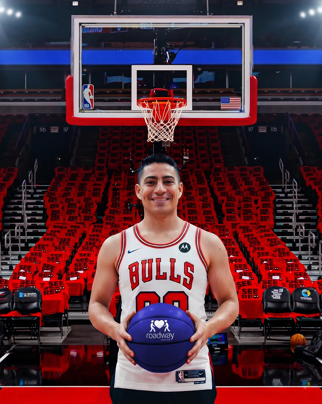 Mover in a Bulls jersey holding a Roadway Moving basketball under the hoop