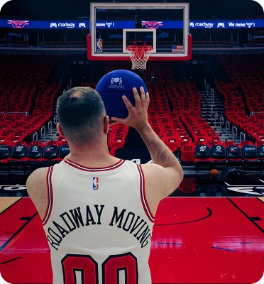 Close-up of Roadway Moving branded jersey number