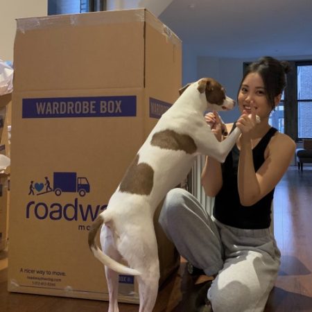 Michelle Choi with her dog during a move with Roadway